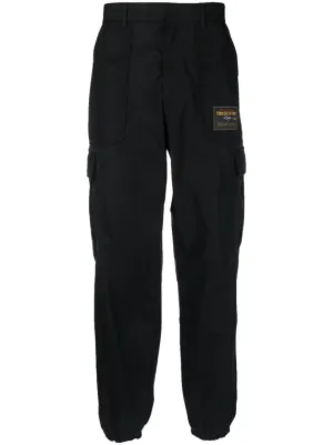 Moschino logo-embroidered straight-leg Trousers | Black | FARFETCH