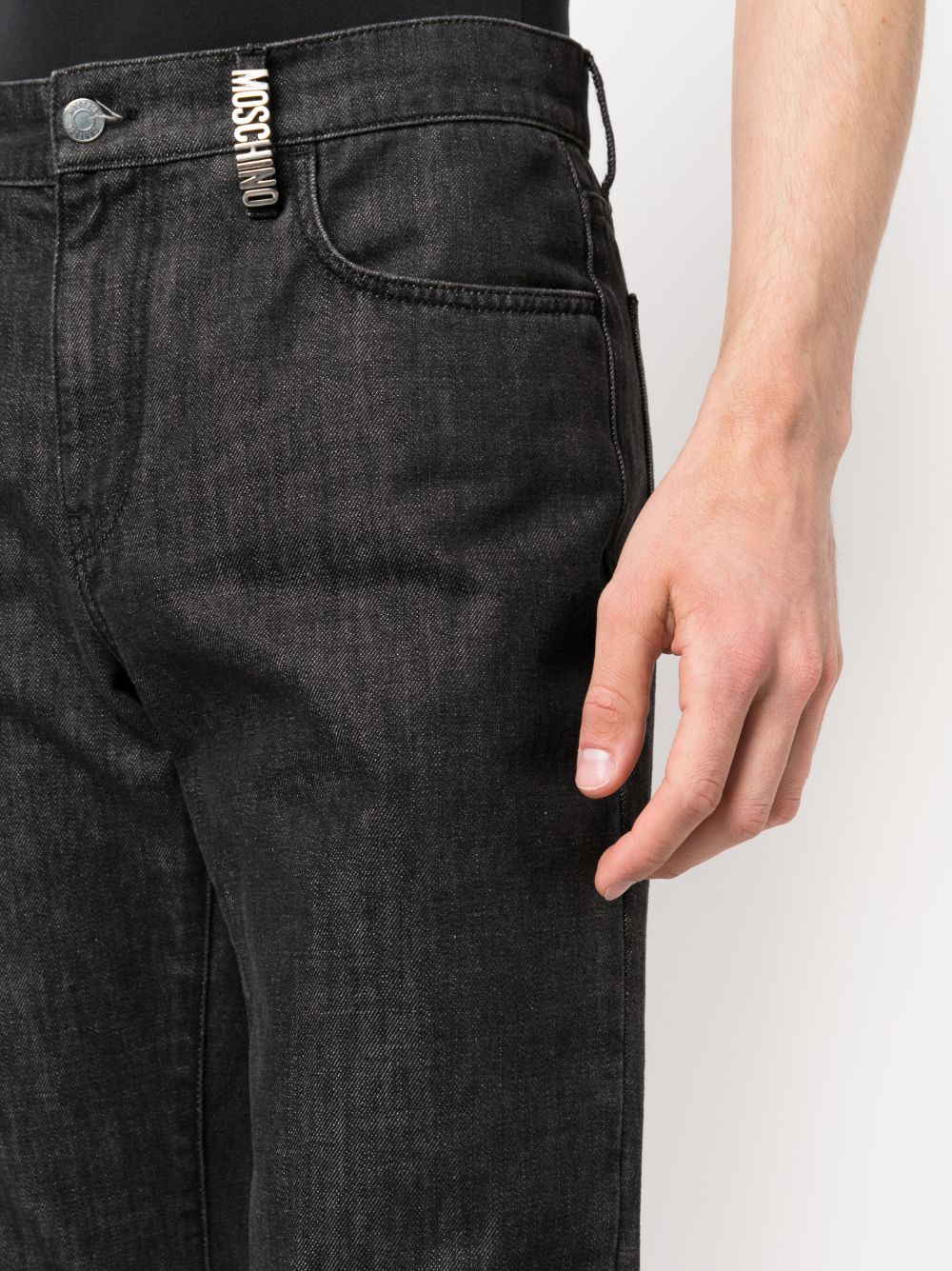 Shop Moschino Dark-wash Slim-fit Jeans In Black