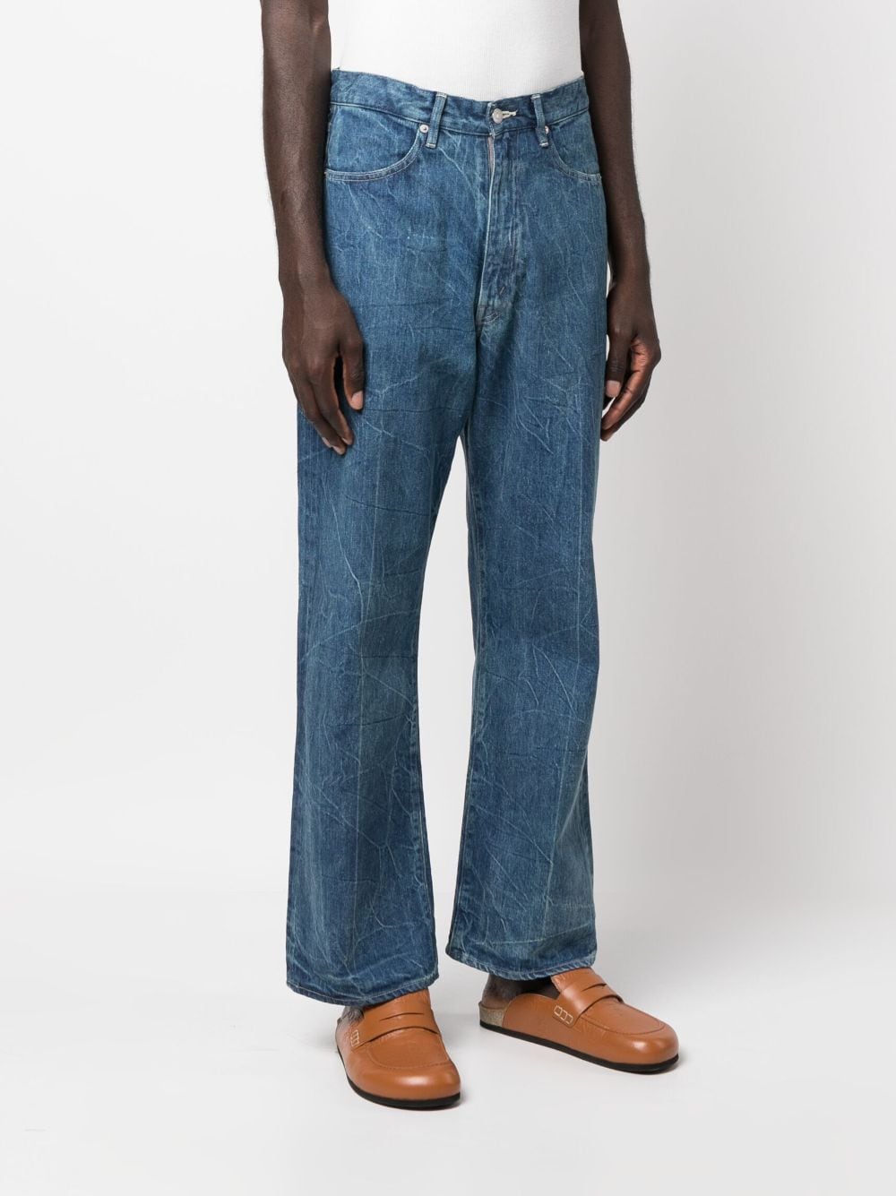 Shop Auralee Crinkled-finish Flared-leg Jeans In Blau