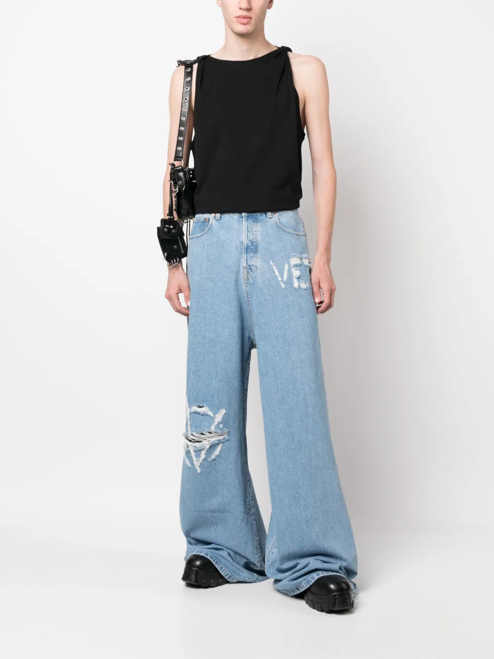 VETEMENTS logo-distressed baggy jeans - Blauw