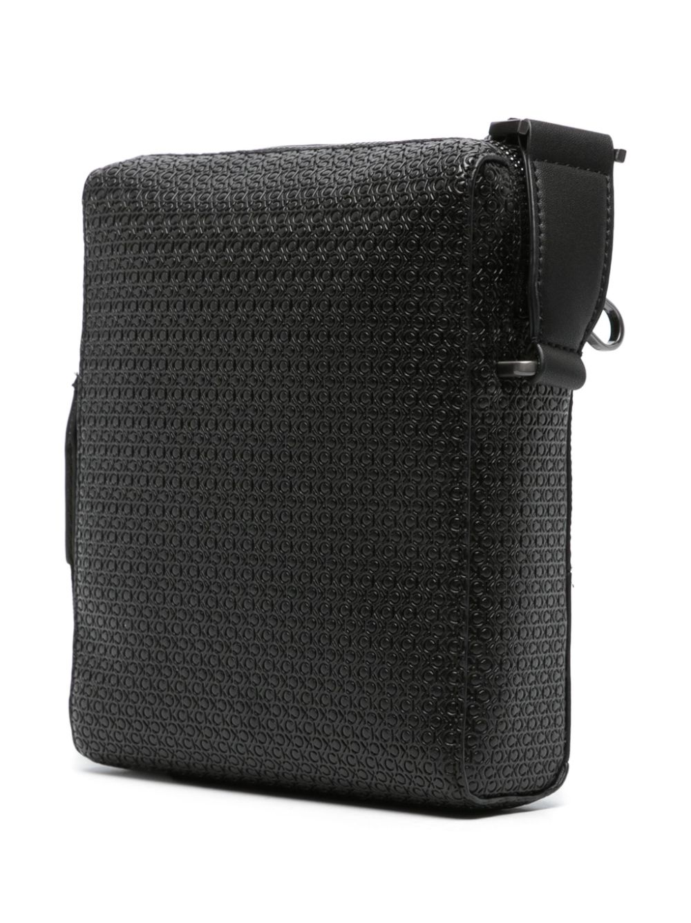 Shop Calvin Klein Embossed Monogram-pattern Messenger Bag In Black