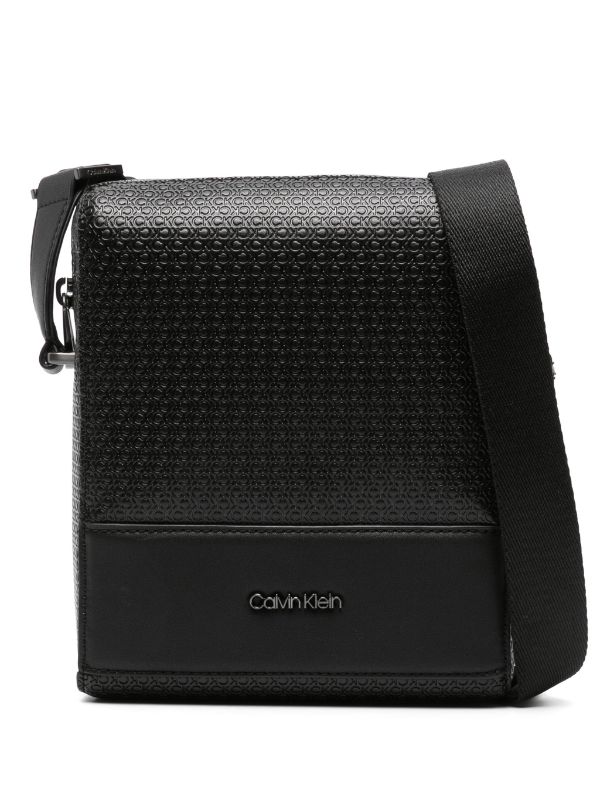 Calvin Klein Embossed monogram-pattern Messenger Bag - Farfetch
