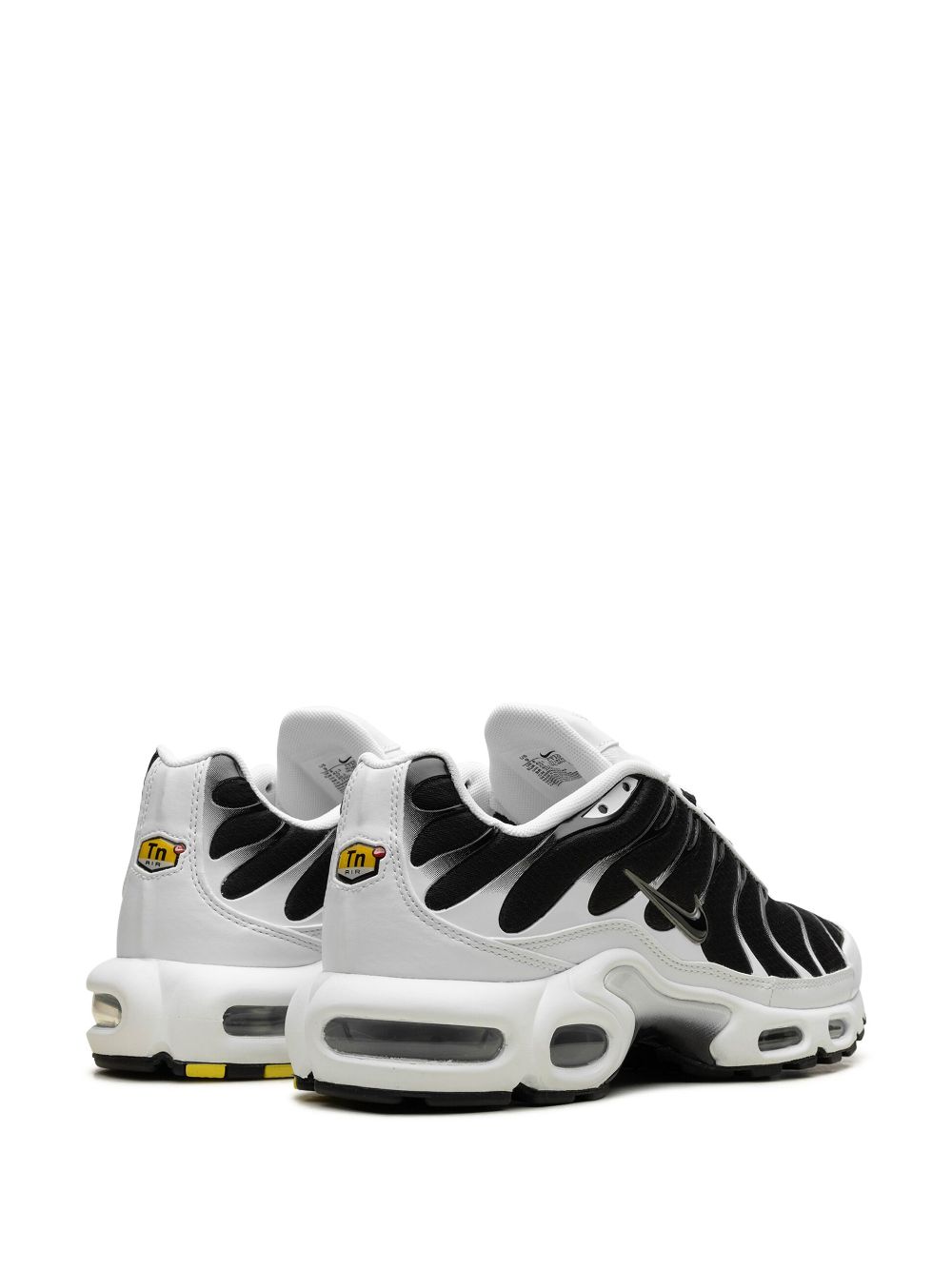 Shop Nike Air Max Plus "black / White" Sneakers