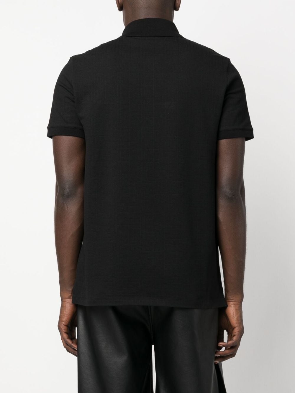 Shop Balmain Monogram-pattern Piqué Polo Shirt In Black
