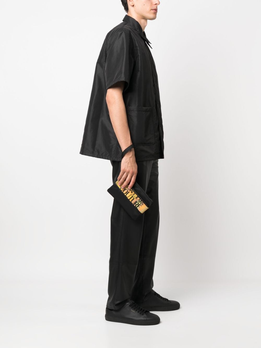 Shop Versace Jeans Couture Logo-print Zip-fastening Clutch Bag In Black