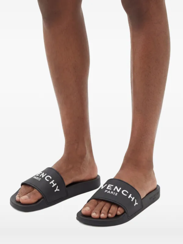 Givenchy logo-debossed Slides | Black | FARFETCH