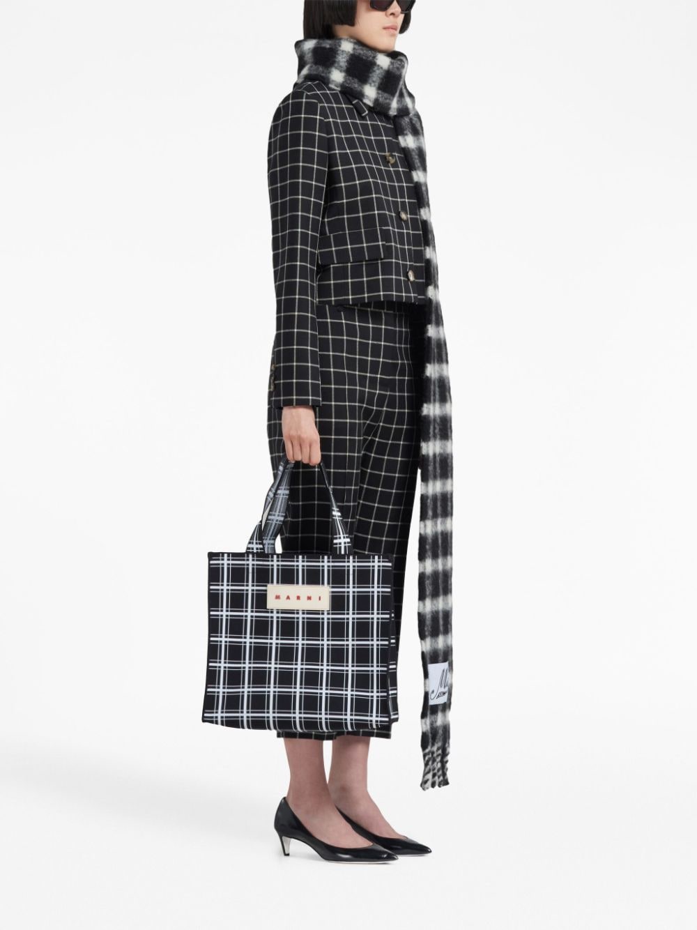 Shop Marni Checked Wool Trousers In Black