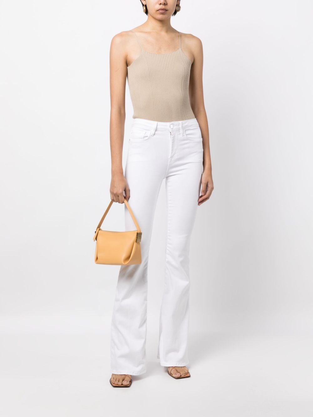 Shop Frame Le One Bootcut Jeans In White