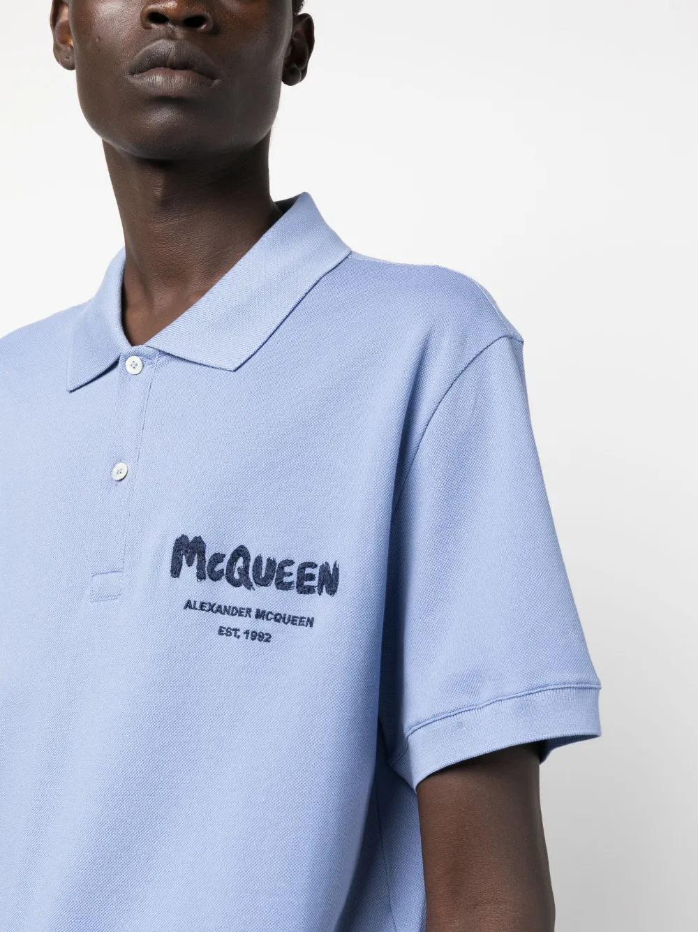 Shop Alexander Mcqueen Graffiti-embroidered Polo Shirt In Blue