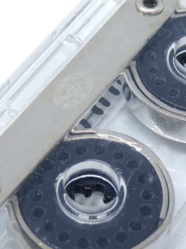 Chanel Pre-owned 2004 Cassette logo-print Brooch - White