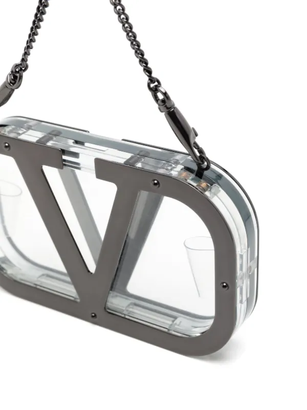 Valentino Garavani logo-plaque Clear Clutch | Black | FARFETCH
