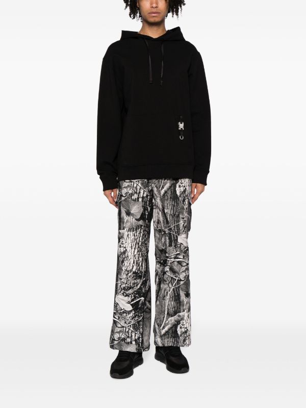 Children Of The Discordance graphic-print Cotton Trousers - Farfetch