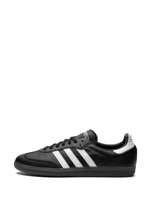 Adidas black store shoes white sole