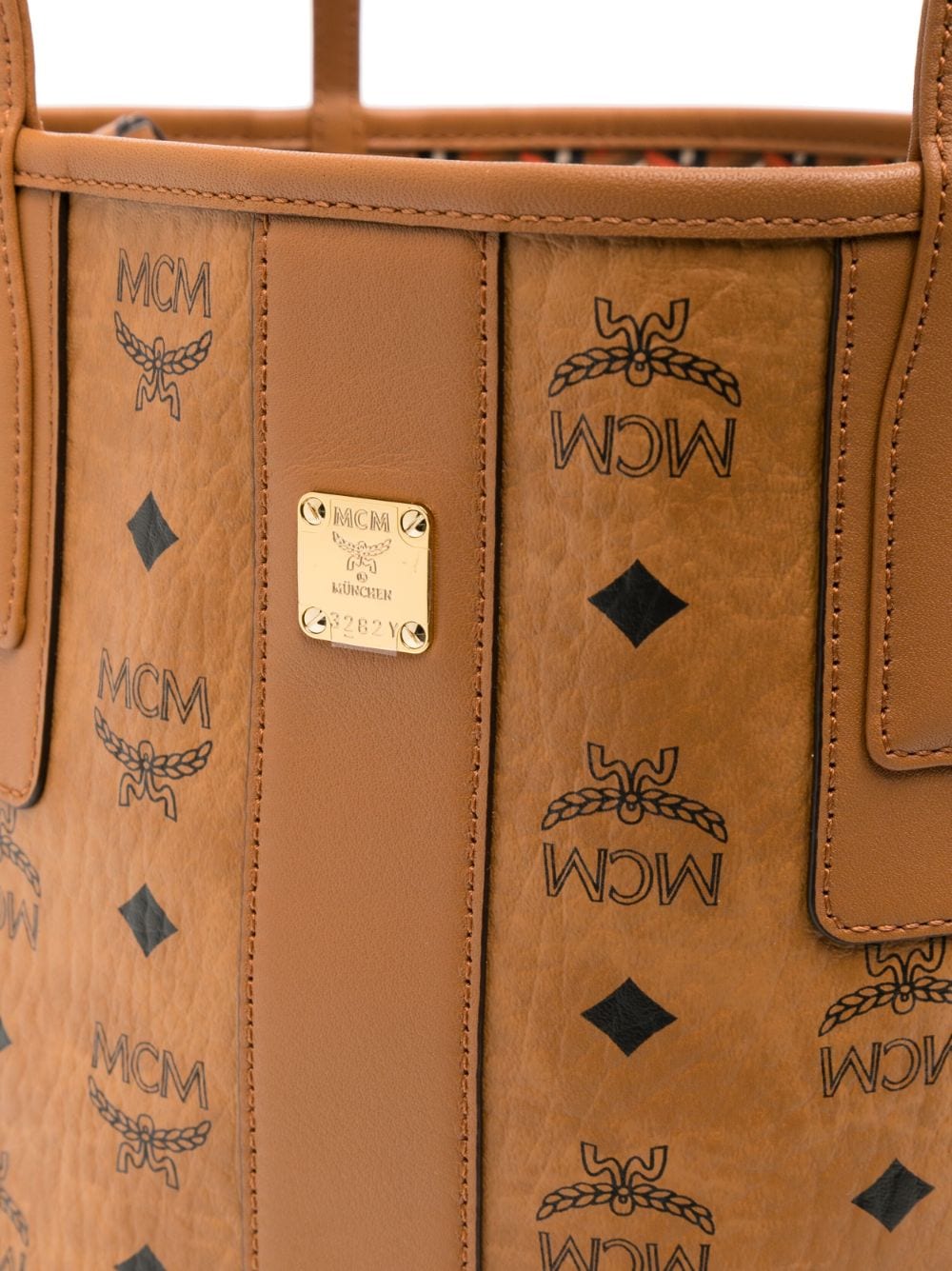 Shop Mcm Small Liz Monogram-pattern Tote Bag In Brown
