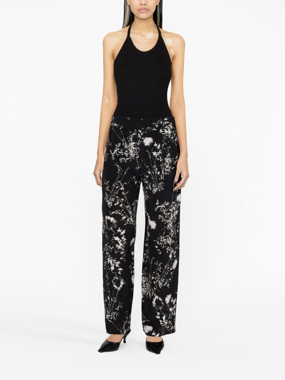 Shop Victoria Beckham Floral-print Silk Trousers In Black