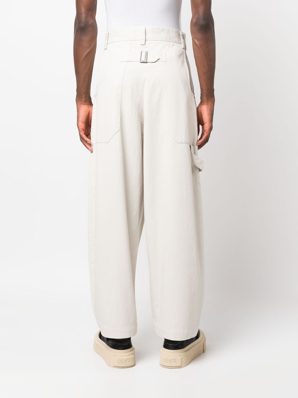 Studio Nicholson Yale Pleated Cotton Trousers In Off White | ModeSens