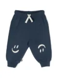 Molo Simeon smiley-motif track pants - Blue