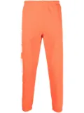 Heron Preston HPNY-print tapered track pants - Orange