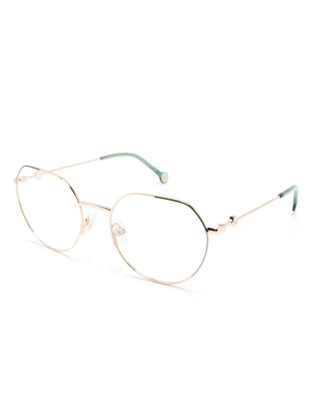 Shop Carolina Herrera Metallic Round-frame Glasses In Gold