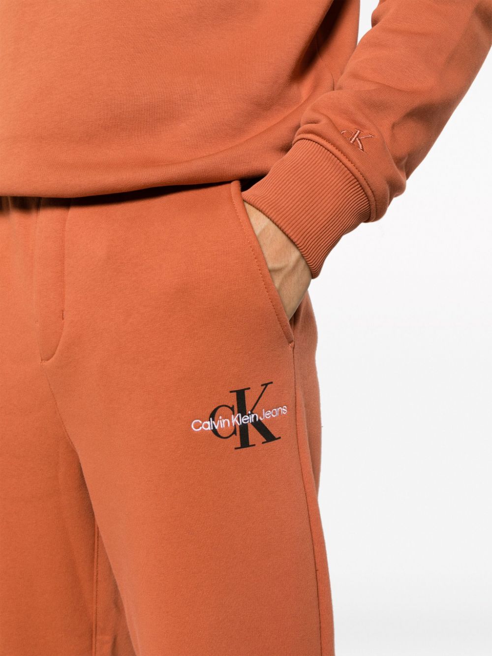 Calvin Klein Jeans Trainingsbroek met geborduurd logo Oranje