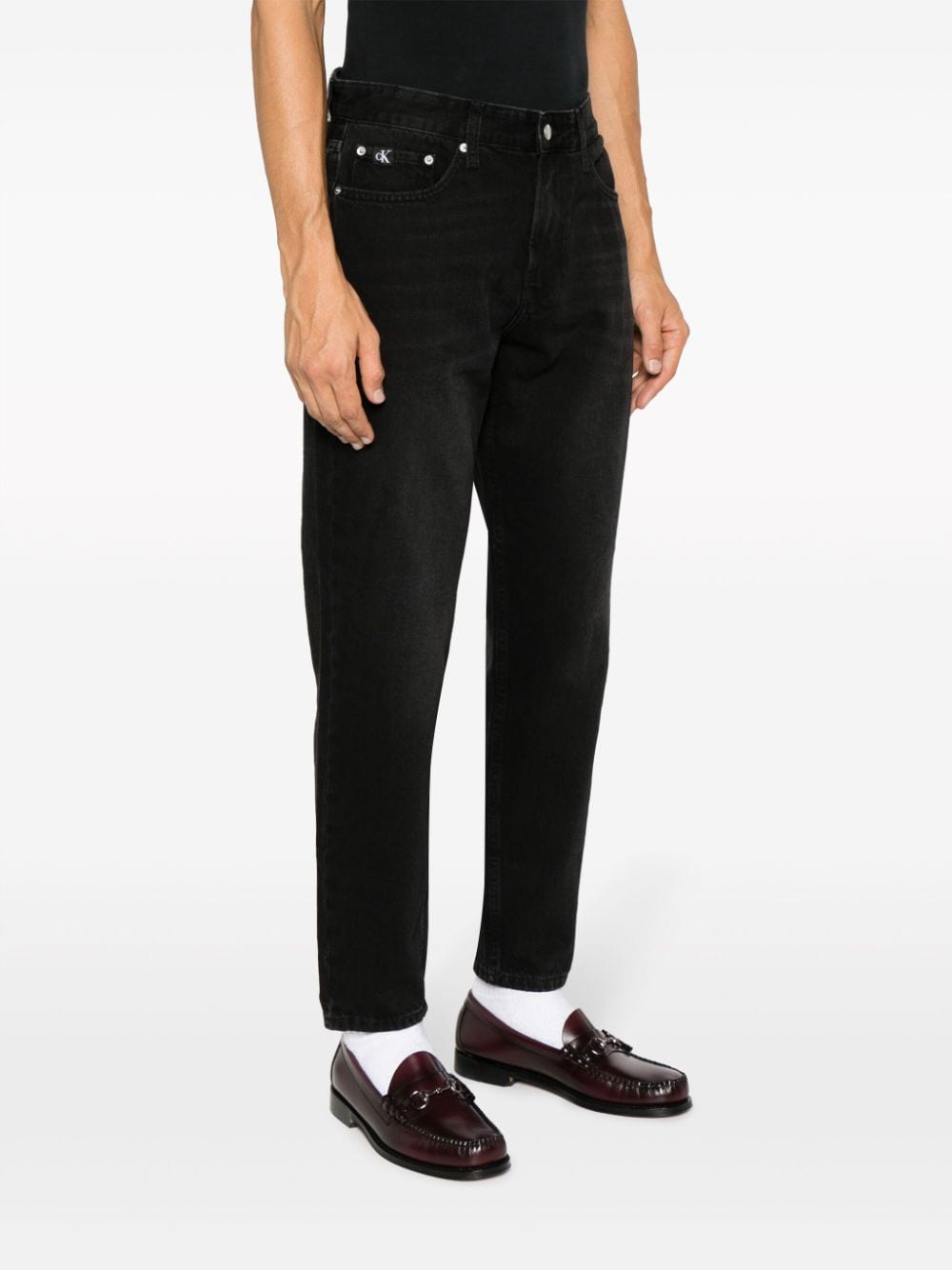 Calvin Klein Jeans met toelopende pijpen Zwart
