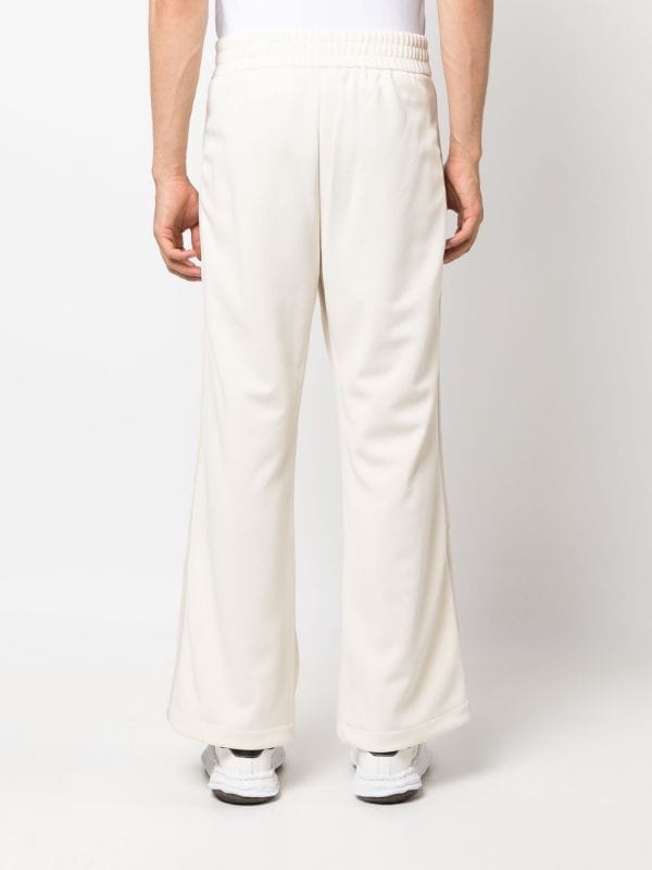 Palm Angels logo-embroidered Flared Track Pants - Farfetch