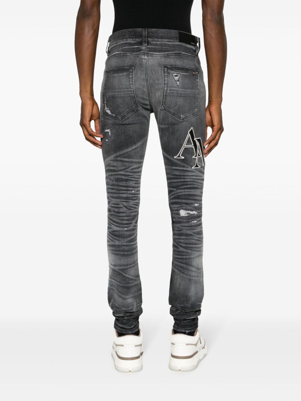 Shop Amiri Logo-print Ripped Skinny Jeans In Grey