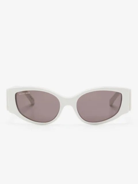 Balenciaga Eyewear lentes de sol con armazón oval y logo estampado