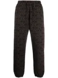 Moschino logo-print elasticated-waistband track pants - Brown