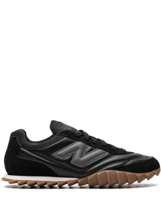 New balance leather sneakers hot sale mens