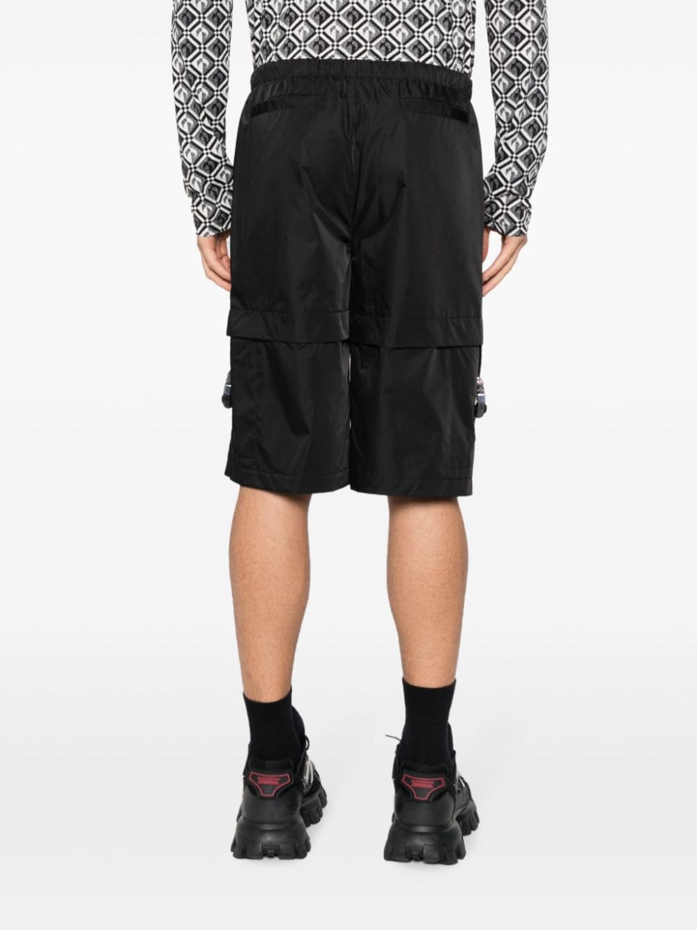 Shop Givenchy 4g-motif Slip-on Deck Shorts In Black