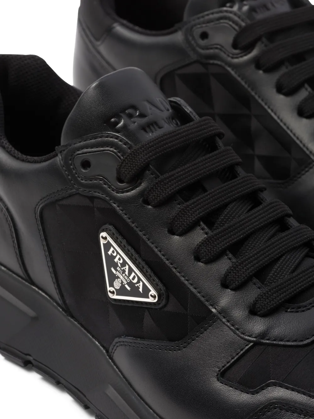 Shop Prada Logo-jacquard Leather Sneakers In Black