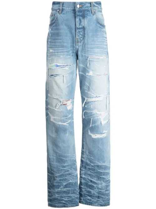 Jean slim à effet usé - AMIRI - Modalova