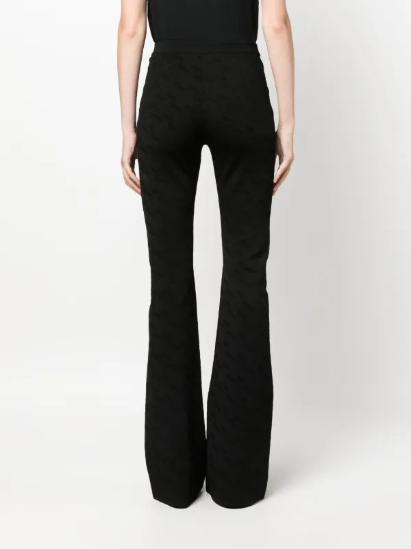 Versace Greca-knit Flared Trousers | Black | FARFETCH IN