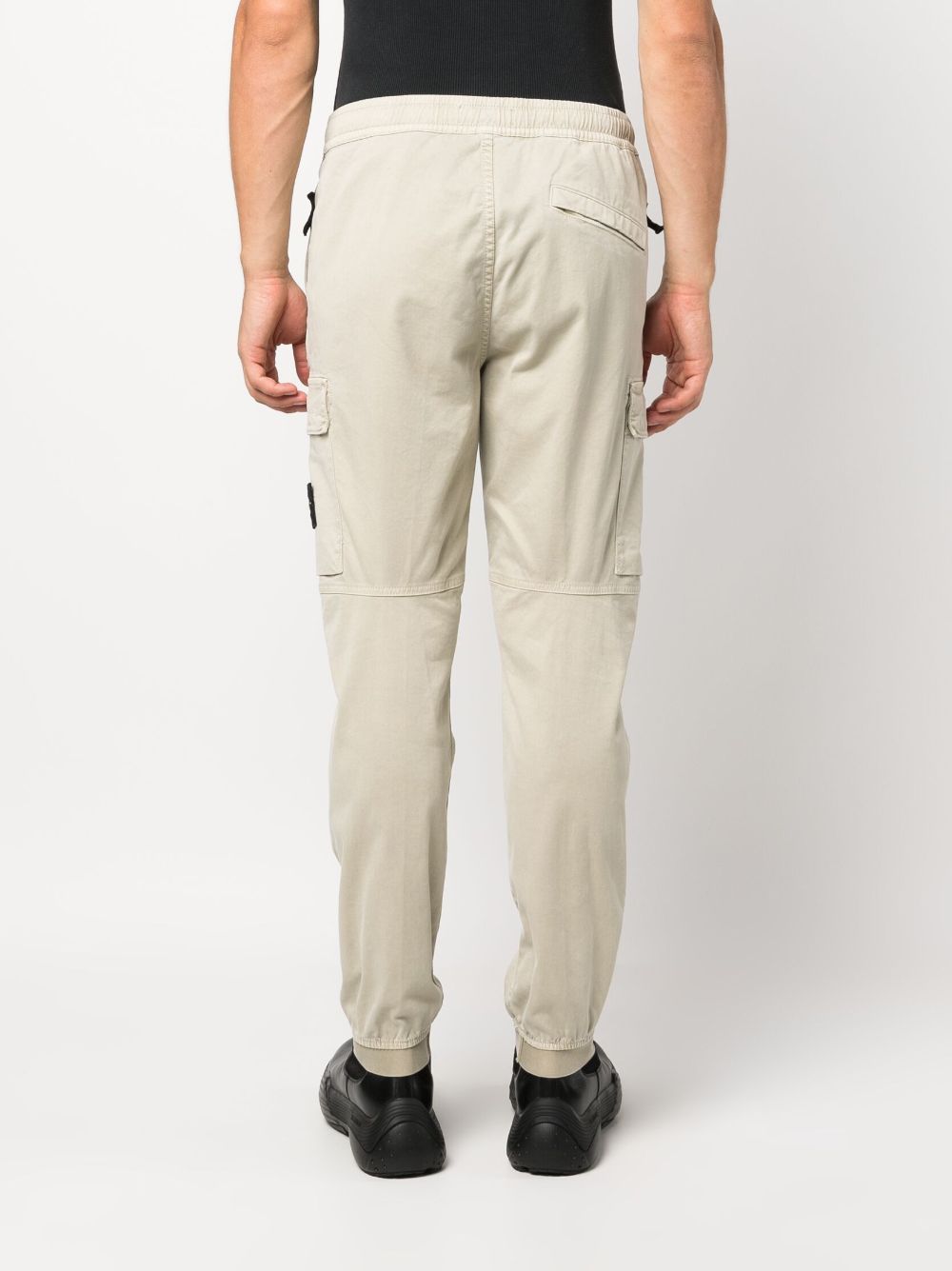 Shop Stone Island Tapered-leg Cargo Trousers In Neutrals