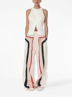 Rosie Assoulin Cut Out Knee Flared Trousers, $1,268, farfetch.com