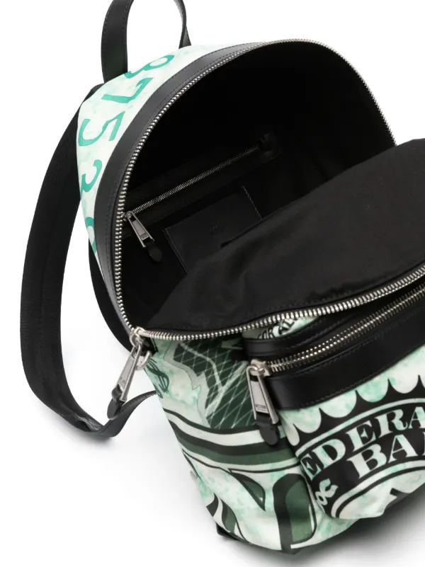 Moschino money print Leather Backpack Farfetch