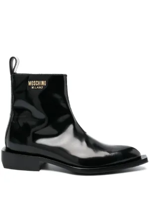 Moschino Camperos logo plaque patent leather Boots Farfetch