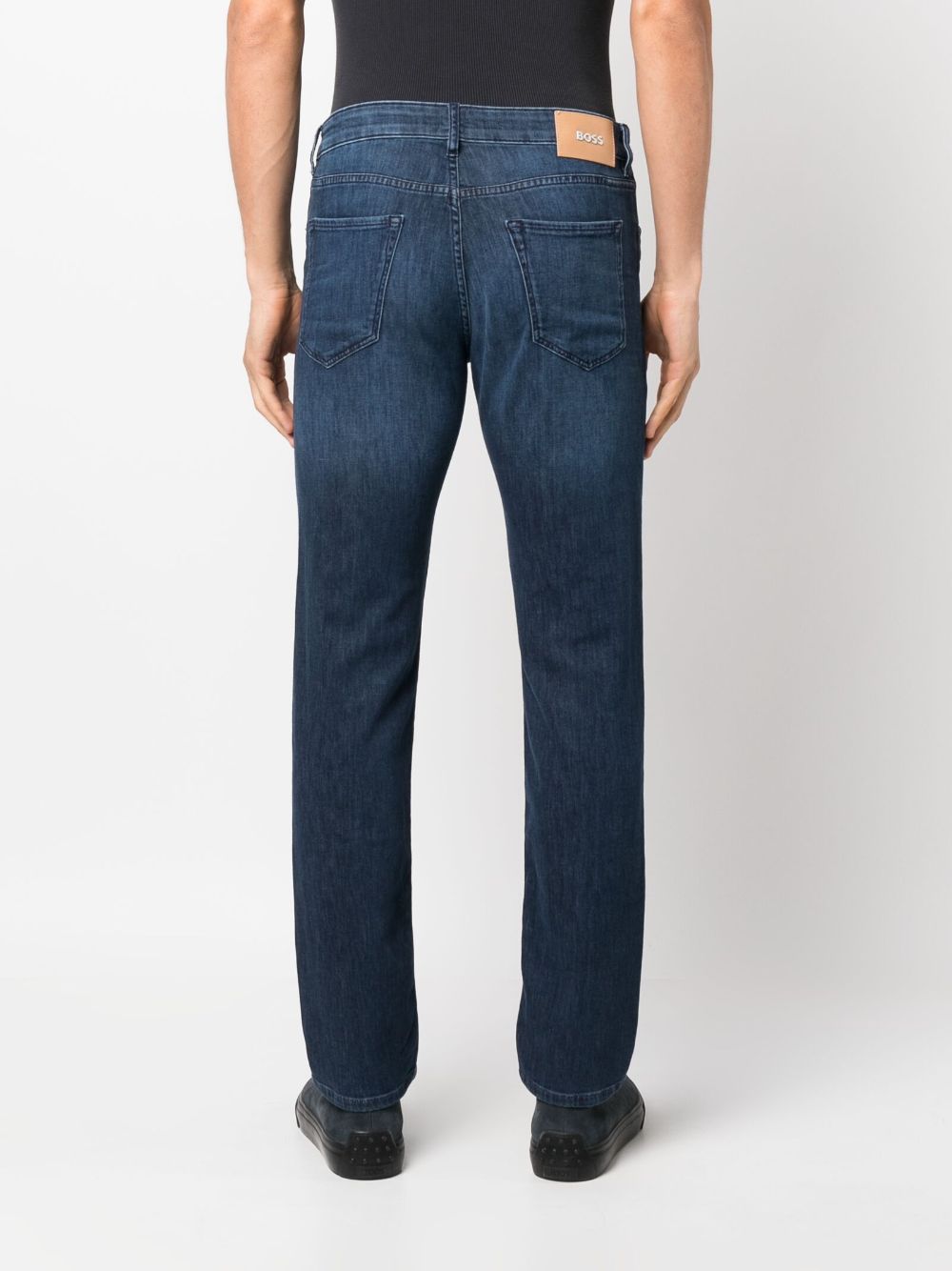 Shop Hugo Boss Logo-patch Tapered-leg Jeans In Blue