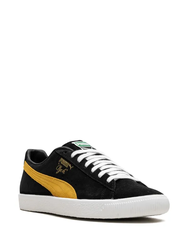 Puma on sale black yellow