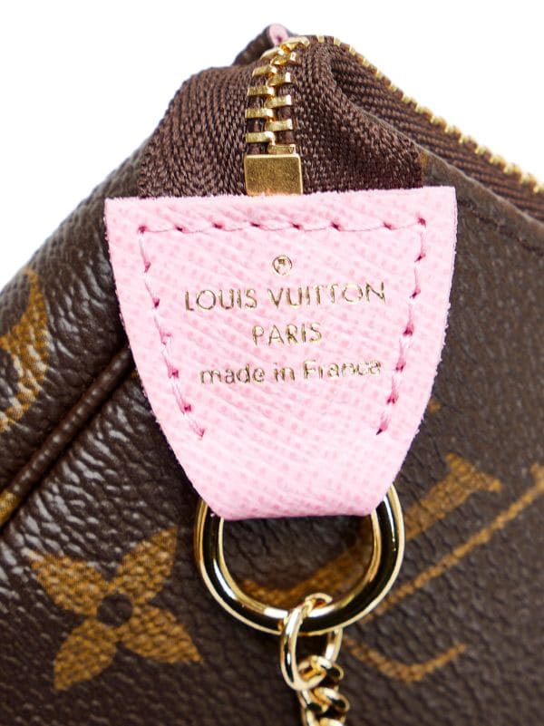 Louis Vuitton 2022 pre-owned Pochette Accessoires Vivienne Clutch Bag -  Farfetch