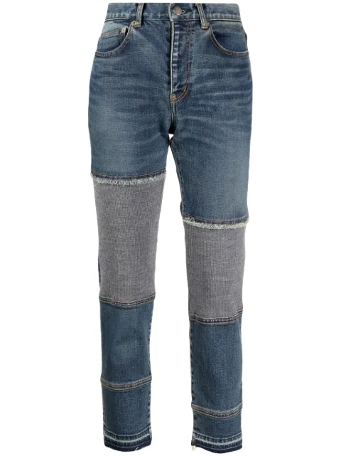 Undercover logo-patch panelled-design jeans 