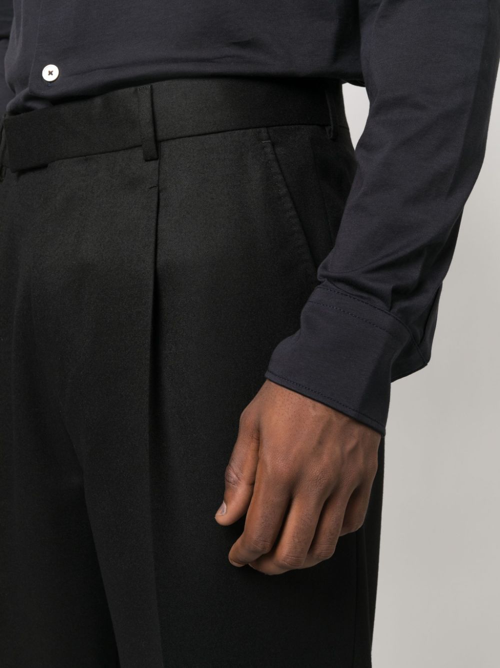 Shop Zegna Pleated Wool Trousers In Black