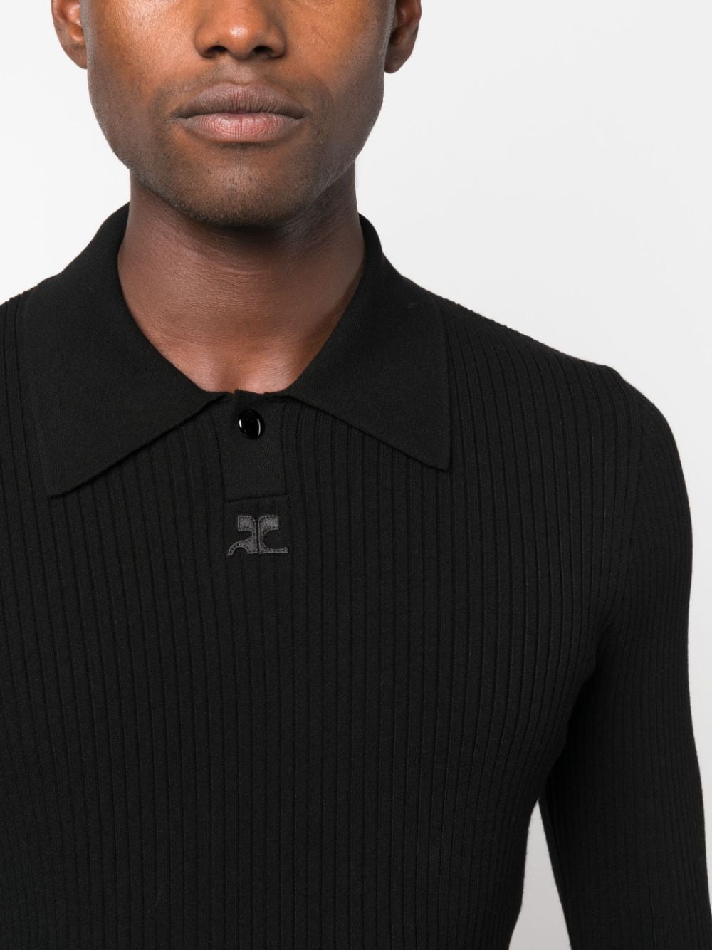 Shop Courrèges Logo-patch Ribbed Polo Shirt In Schwarz