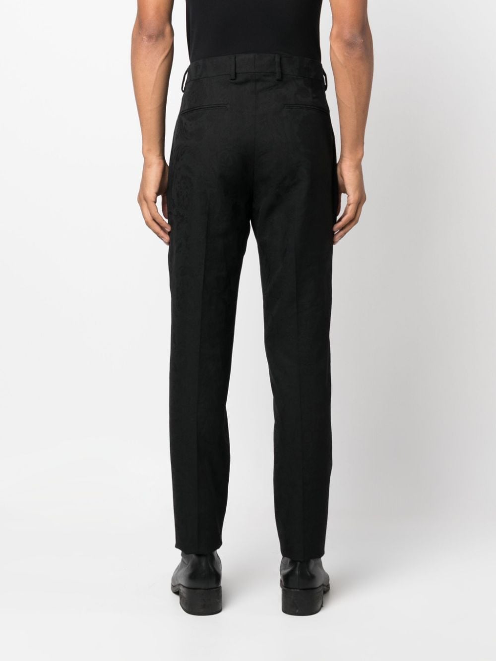 Shop Versace Barocco Silhouette Jacquard Trousers In Black
