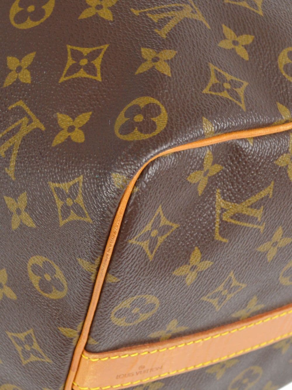 Louis Vuitton Vintage Keepall 50 Travel Bag, $6,506, farfetch.com