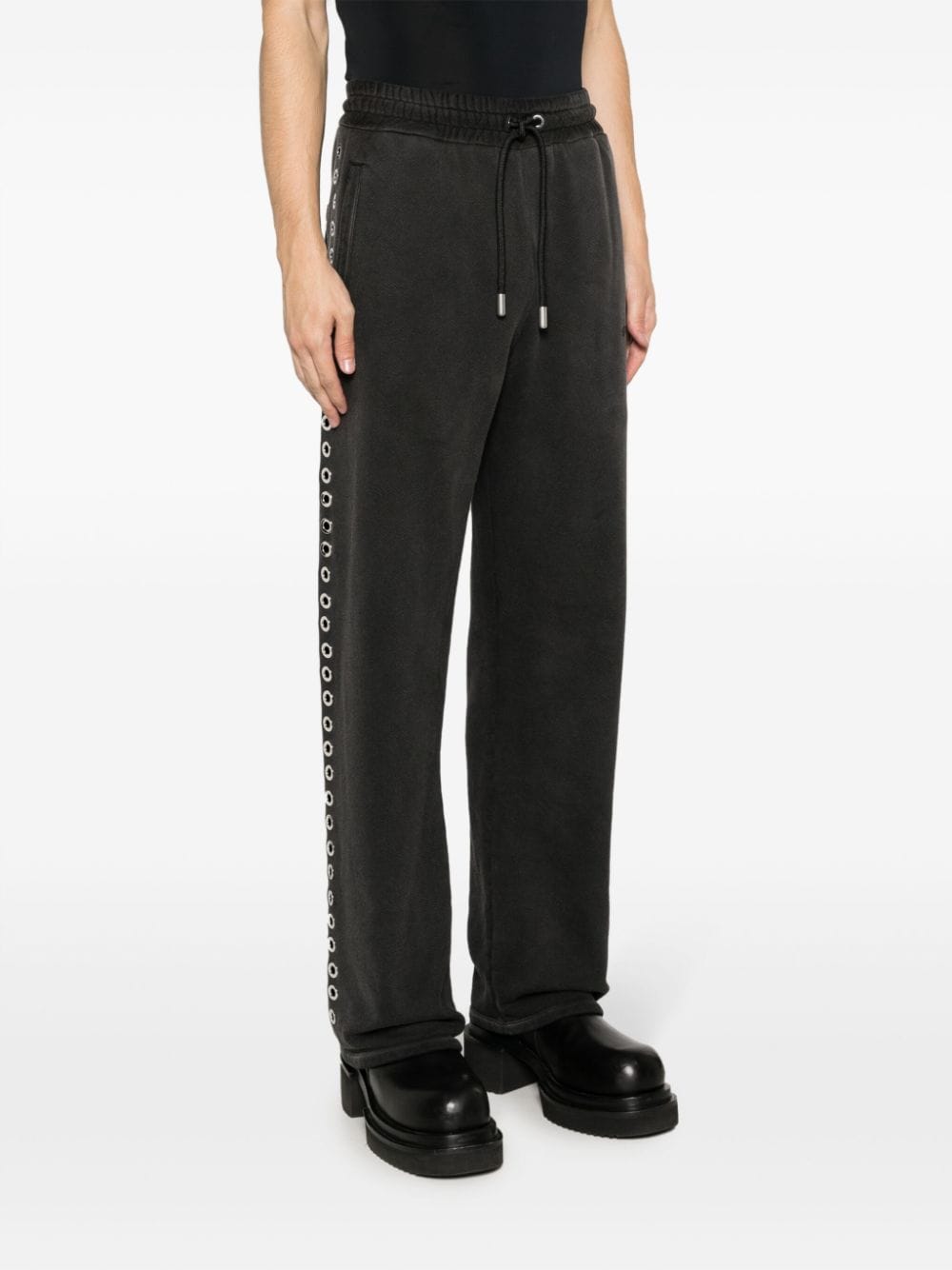 Shop Off-white Eyelet-embellished Track Pants In Black