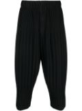 Homme Plissé Issey Miyake pleated tapered cropped trousers - Black