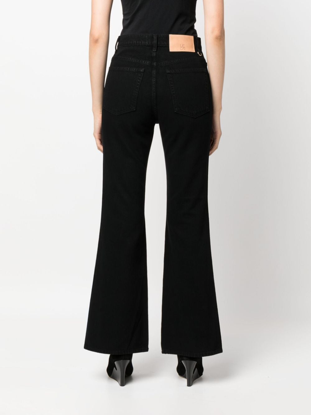 Shop Ulla Johnson The Lou Flared Jeans In Black