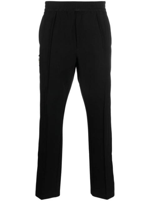 decorative buckle-detail tapered trousers